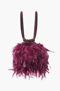 Bolso Bruna Plumas Cereza de Lady Pipa para completar looks de invitada.