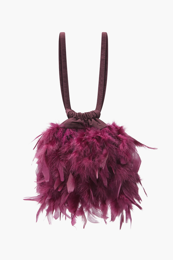 Bolso Bruna Plumas Cereza de Lady Pipa para completar looks de invitada.