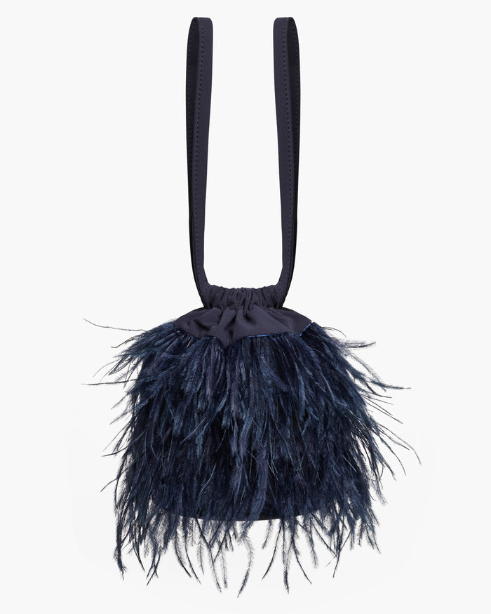 Bolso Bruna Plumas Marino de Lady Pipa para completar looks de invitada.