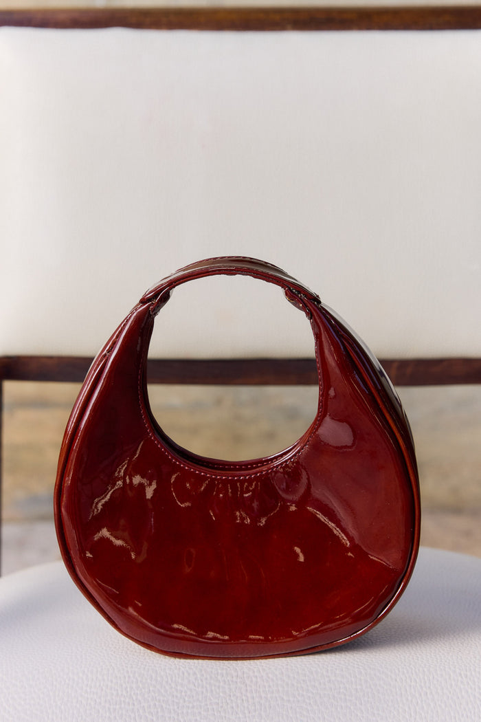 Bolso Eclipse Cereza de Lady Pipa para completar looks de invitada.