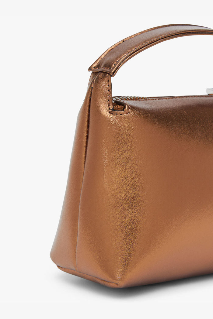 Bolso Sonora Cobre de Lady Pipa para completar looks de invitada.