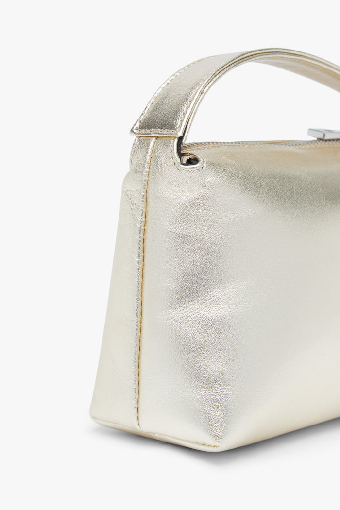 Bolso Sonora Dorado de Lady Pipa para completar looks de invitada.