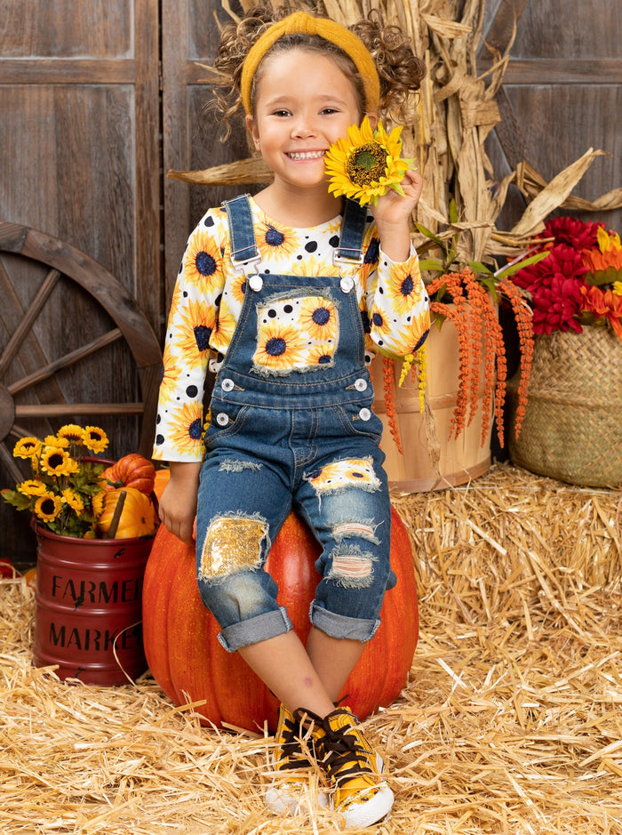 Girls fall long-sleeved sunflower print top and sequin patched denim overalls with adjustable shoulder straps and cuffed hems - Mia Belle Girls