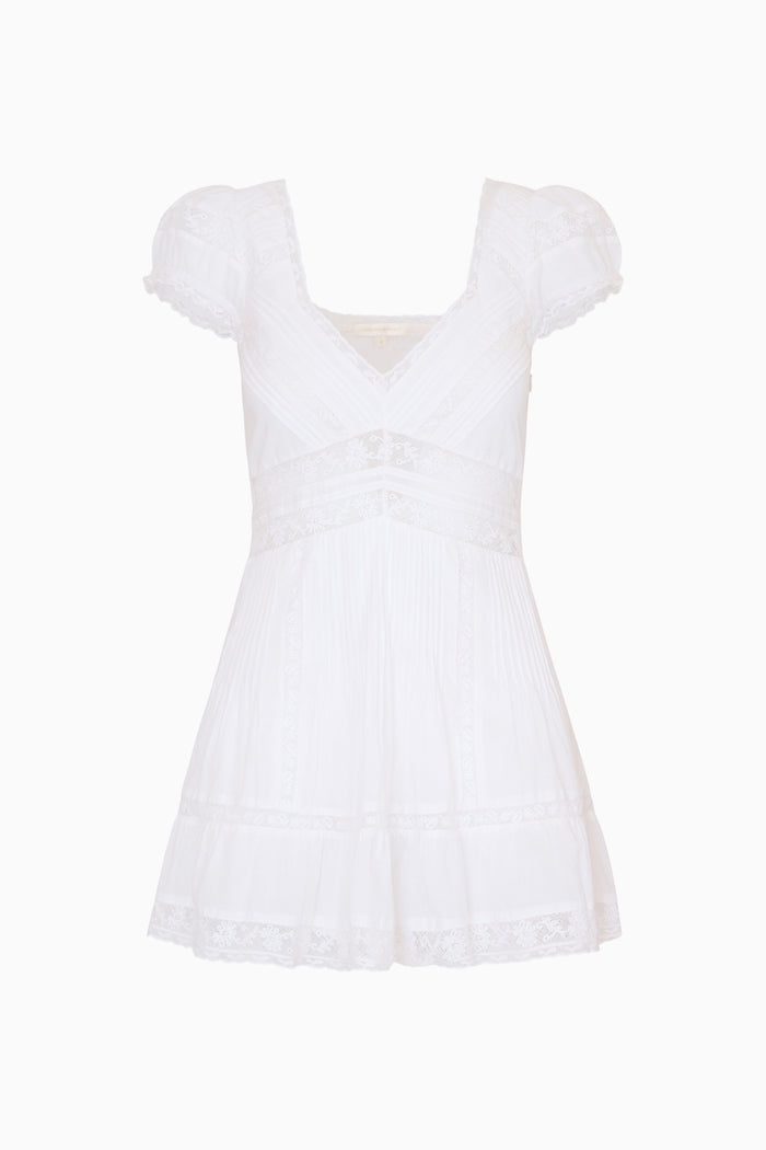 White dress with lace details on a white background