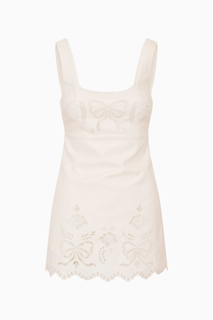 White lace eyelet dress on a white background