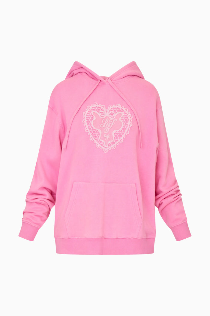 Pink hoodie with a heart design on a white background