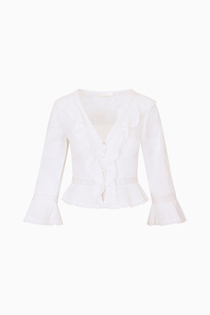 White ruffle top on a white background