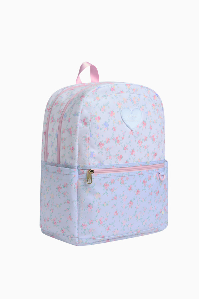 Light blue backpack with pink floral pattern on a white background