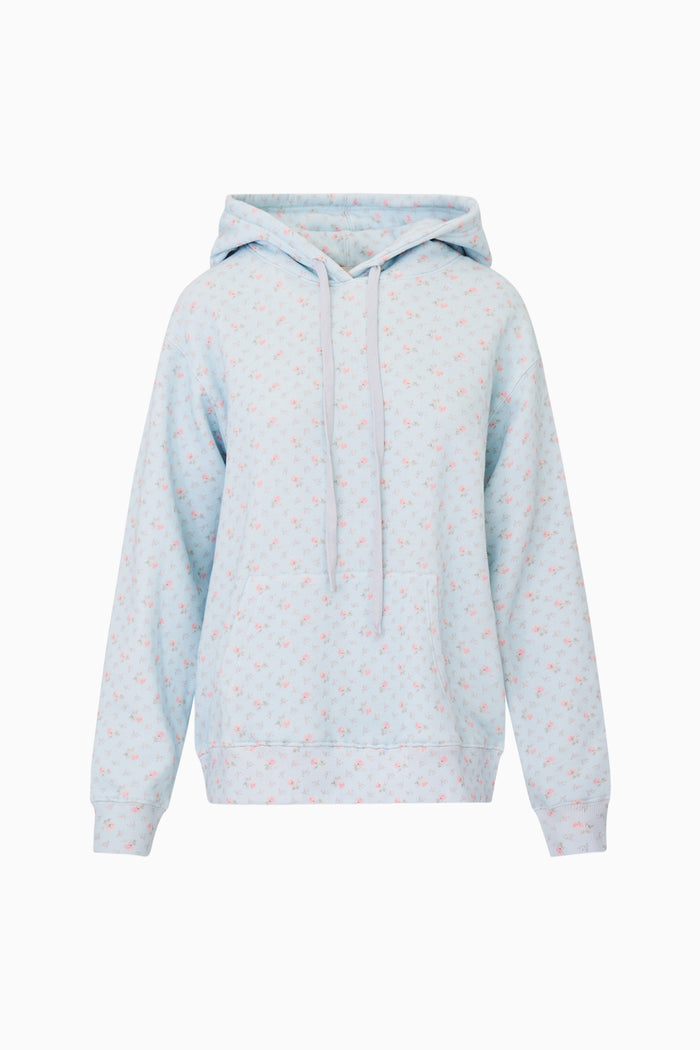 Light blue hoodie with small patterns on a white background