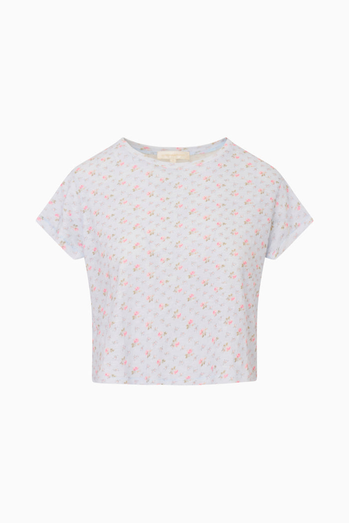 Light blue t-shirt with small pattern on a white background
