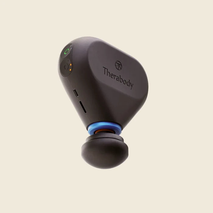 Black Therabody device on a beige background