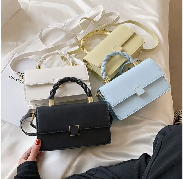 Gold Twisted Fashionable Handbags fashionnsio