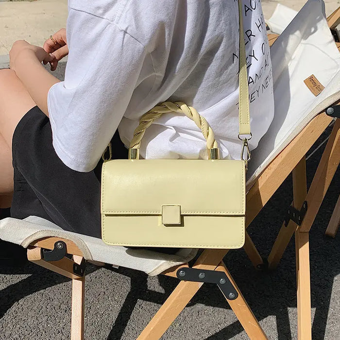 Gold Twisted Fashionable Handbags fashionnsio