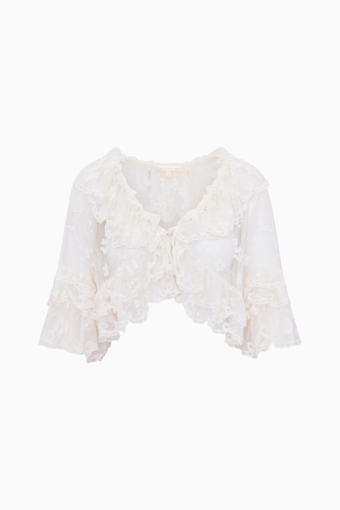 White lace top on a white background